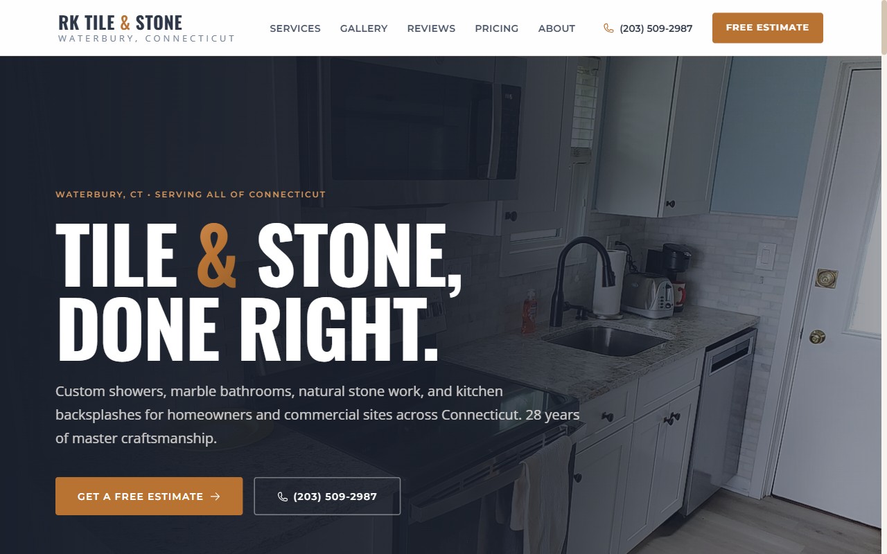 RK Tile & Stone homepage — Calacatta marble shower wall hero with bookmatched veining